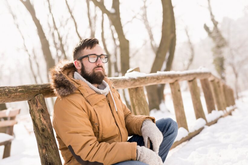 Man relaxing on a winter vacation