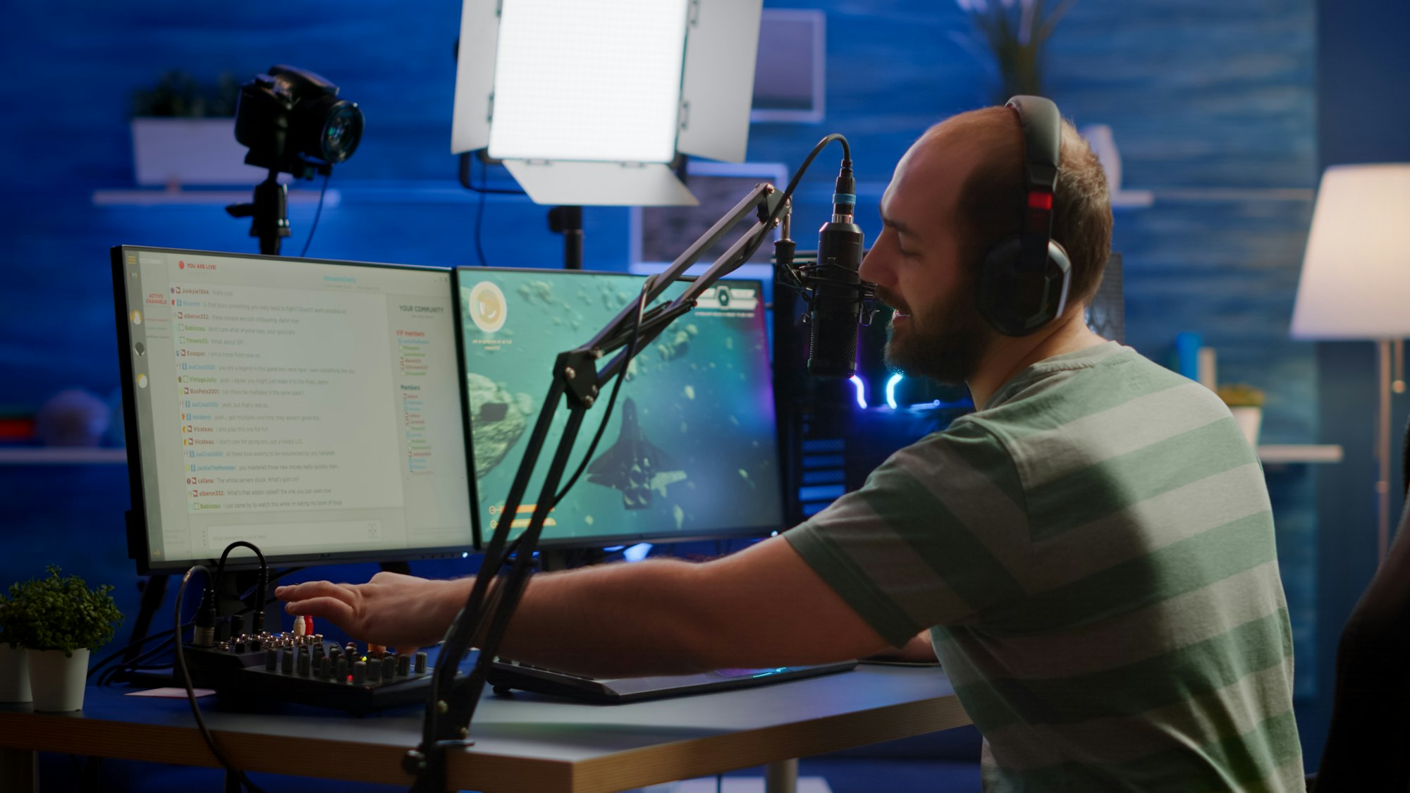 Man streamer cyber checking sound at mixer streaming videogame